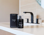 Men's Non Toxic Cologne sitting on a bathroom counter 