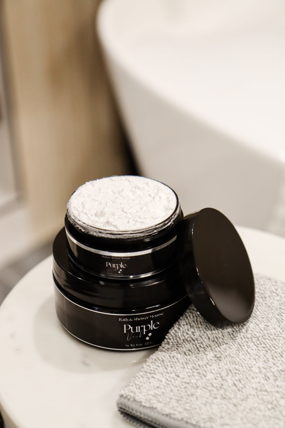 Open shower mousse showing product inside